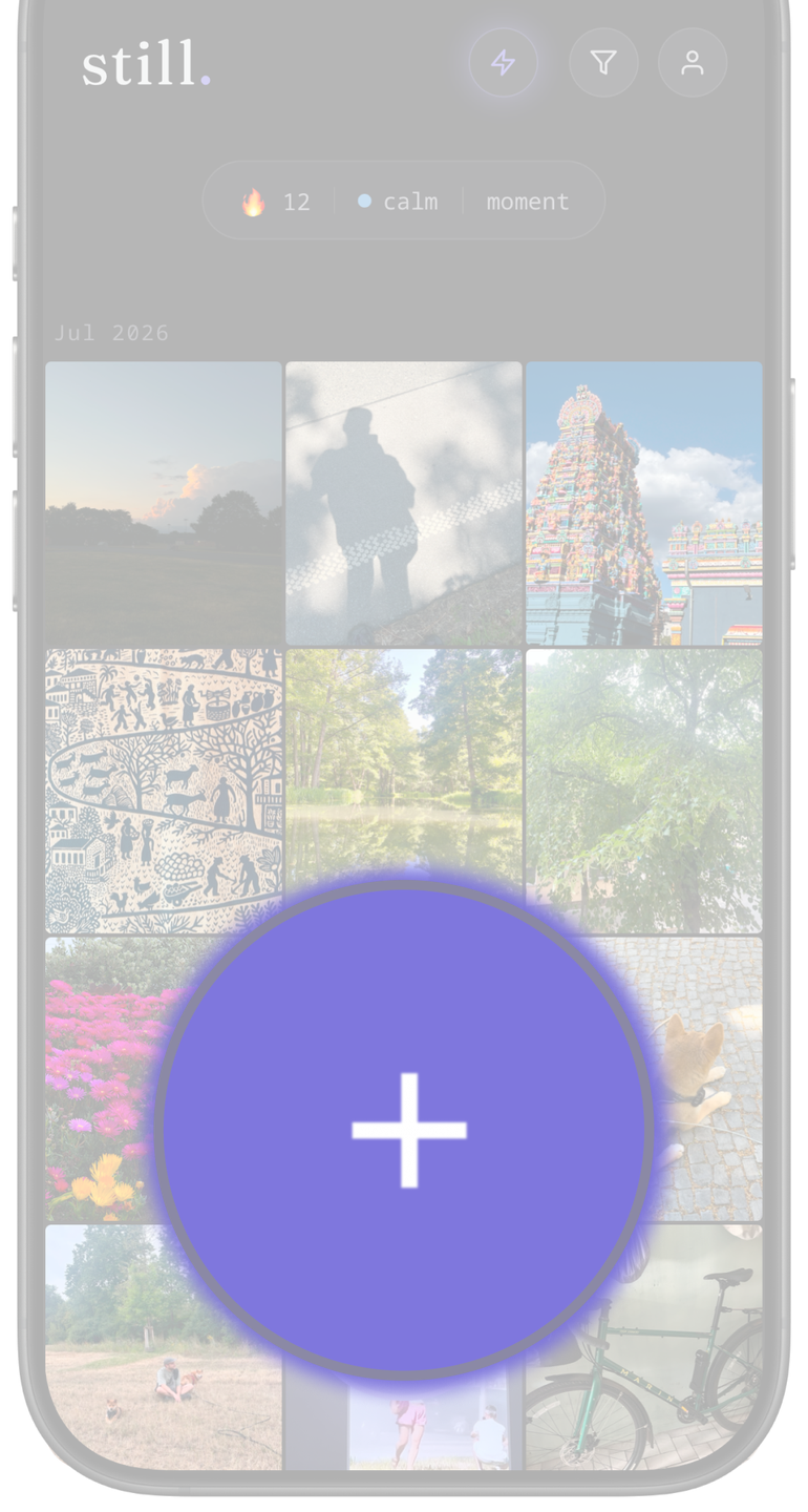 The still app home screen: a grid of photos with a large capture button
